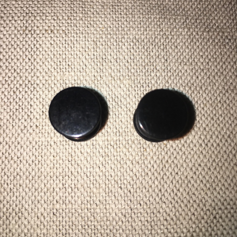 Solid black size zero gauges